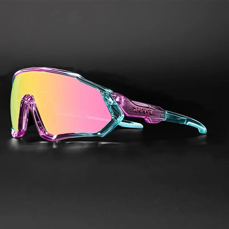 Futuristic oversized sunglasses with iridescent pink lenses and transparent blue-pink frame