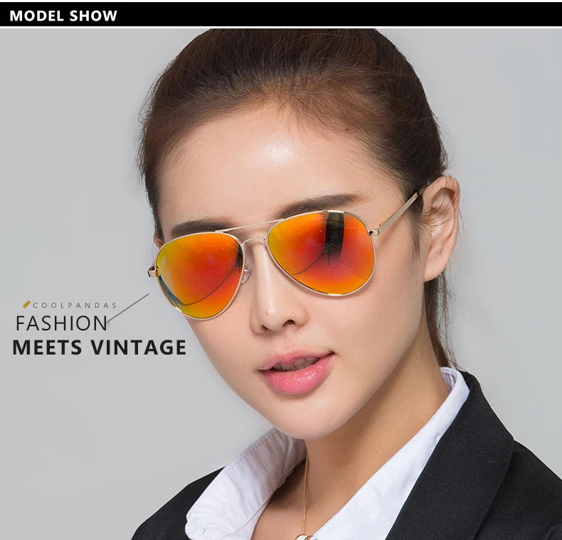 Woman wearing aviator sunglasses with orange mirrored lenses and gold frame, fashion style
