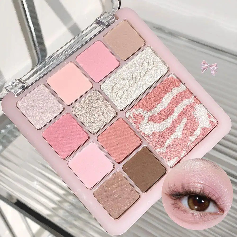 Pink and nude eyeshadow palette with shimmer and matte shades, close-up of eye makeup look.