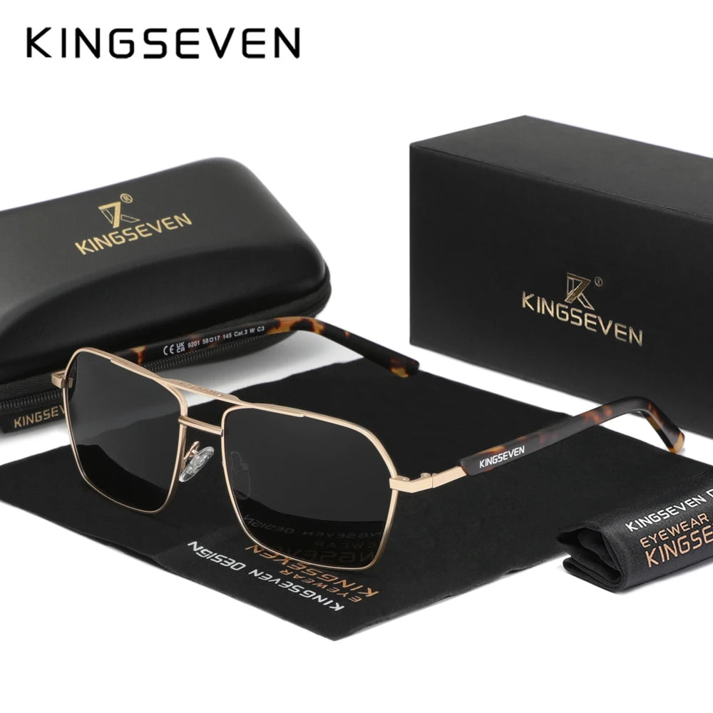 Rectangular black lens sunglasses with gold frame, tortoiseshell arms, and branded case