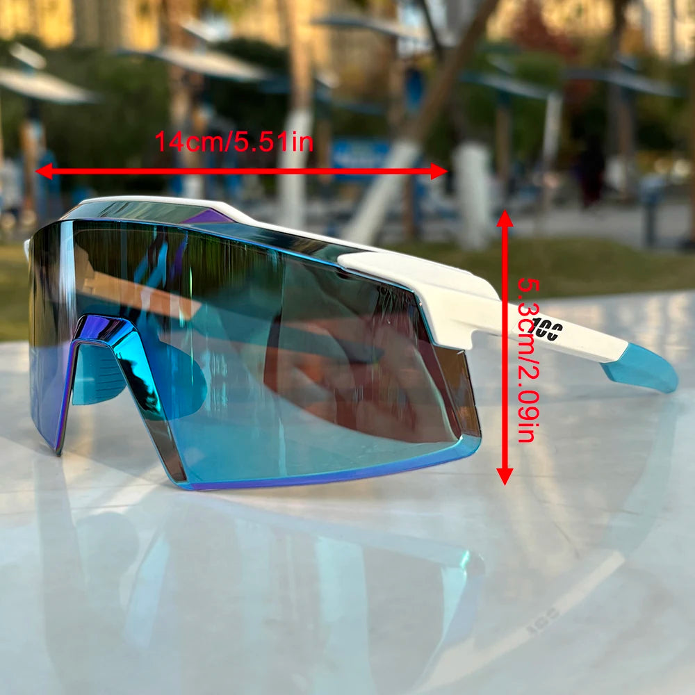 Blue mirrored oversized sunglasses with white arms, 14cm wide, 5.3cm tall on table outdoors