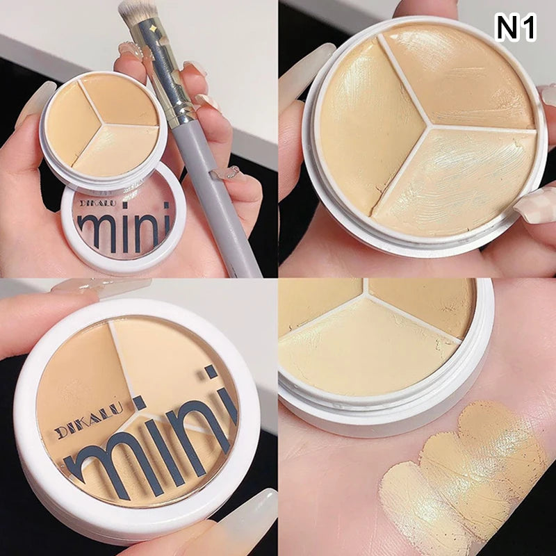 Cream concealer trio palette for face makeup, neutral shades, swatched on hand