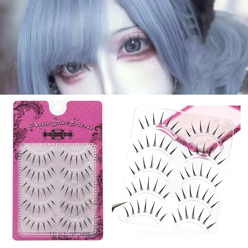 False eyelashes set for cosplay or dramatic eye makeup, black spiked lashes in pink packaging