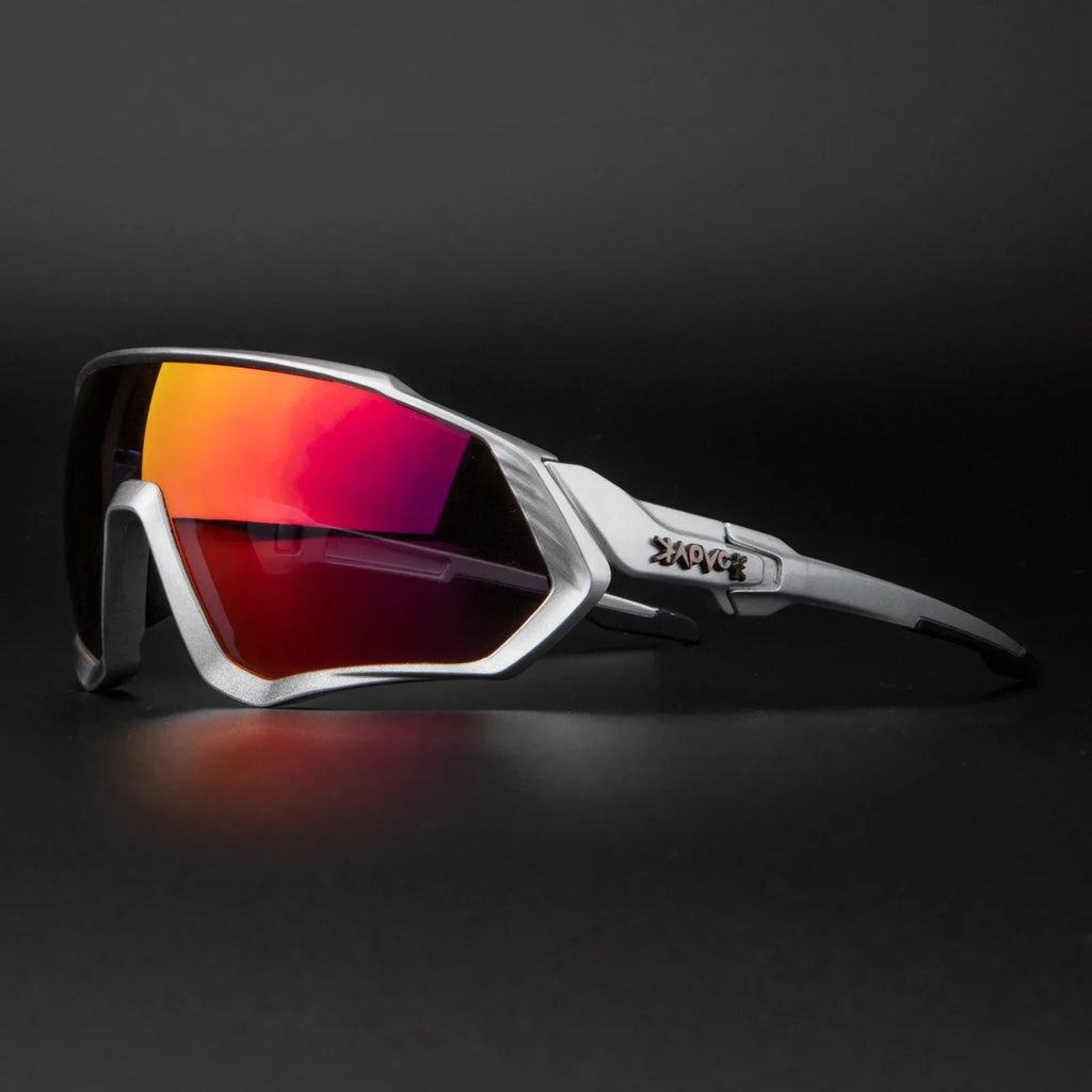 Sport sunglasses with silver frame and red mirrored lenses on black background