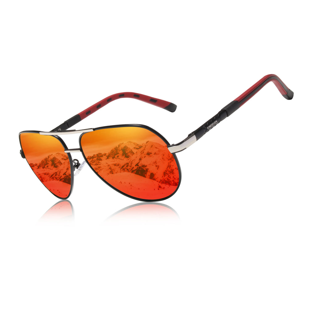 Aviator sunglasses with red-orange mirrored lenses, metal frame, and mountain reflection.