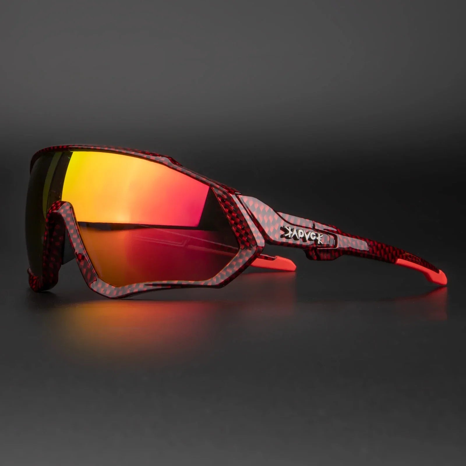 Red carbon fiber sports sunglasses with mirrored yellow-red lenses on black background