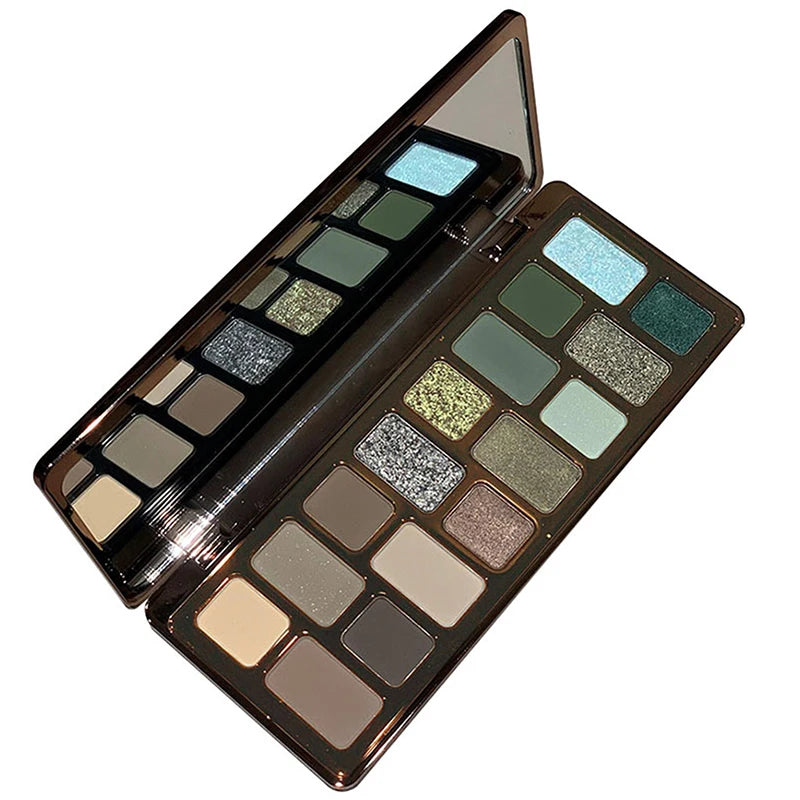 Eyeshadow palette with matte and shimmer green, silver, and neutral shades, open with mirror.