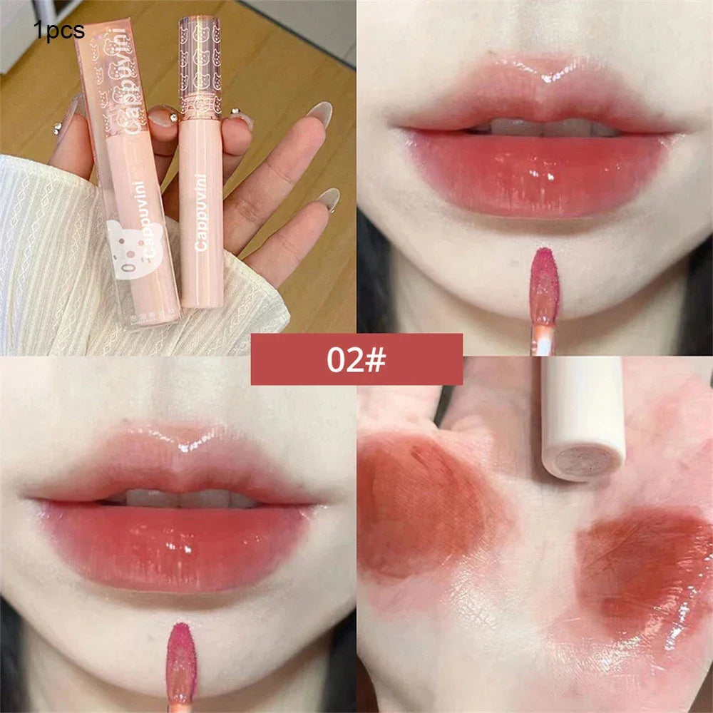 Glossy red lip tint makeup swatched on lips and hand, with applicator and product tube