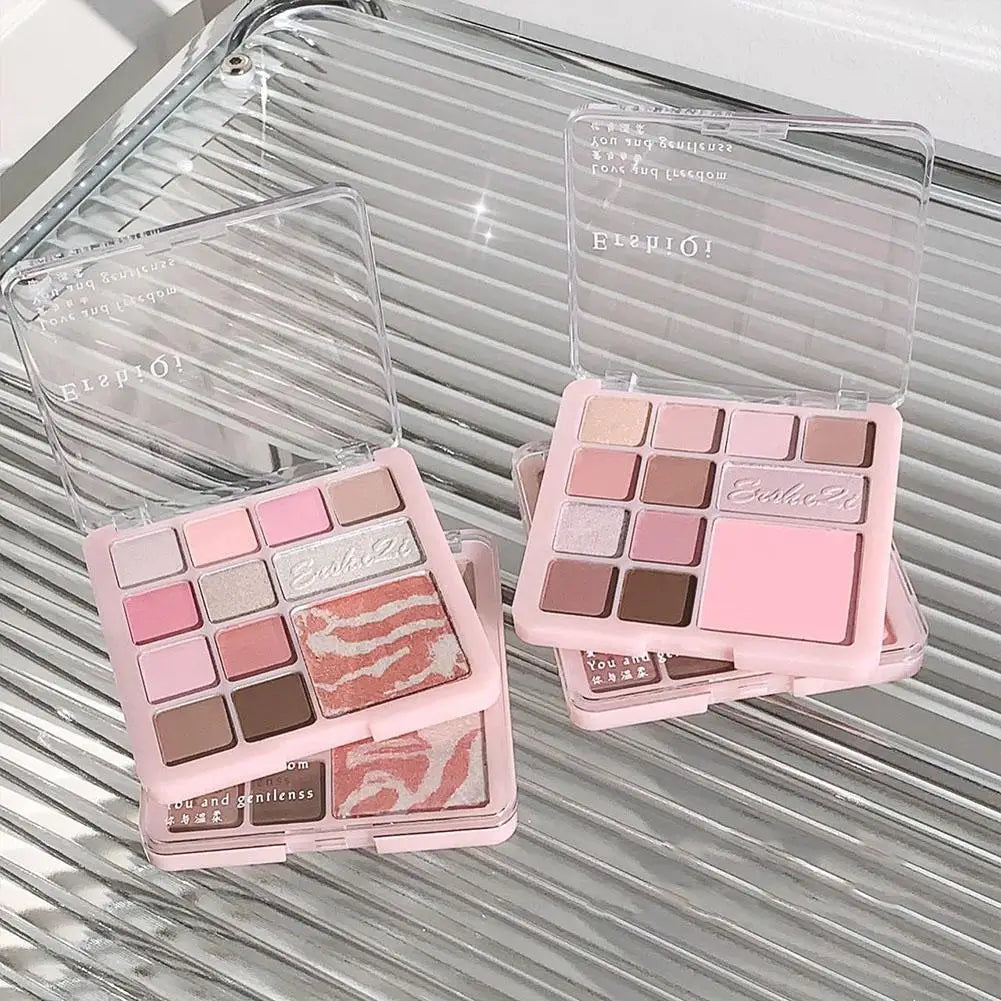 Pink and neutral eyeshadow palettes with shimmer and matte shades on a glass surface.