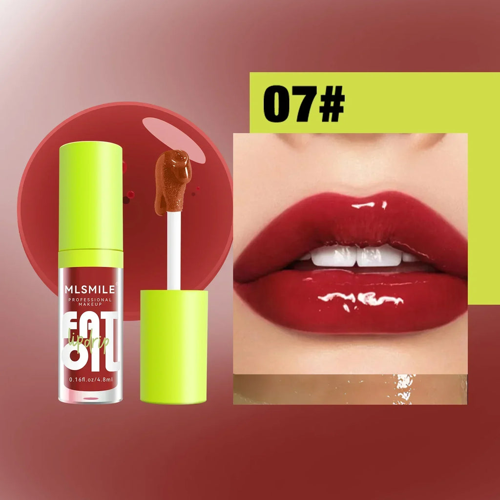 Glossy dark red lip oil, shade 07, with applicator and close-up of lips wearing product