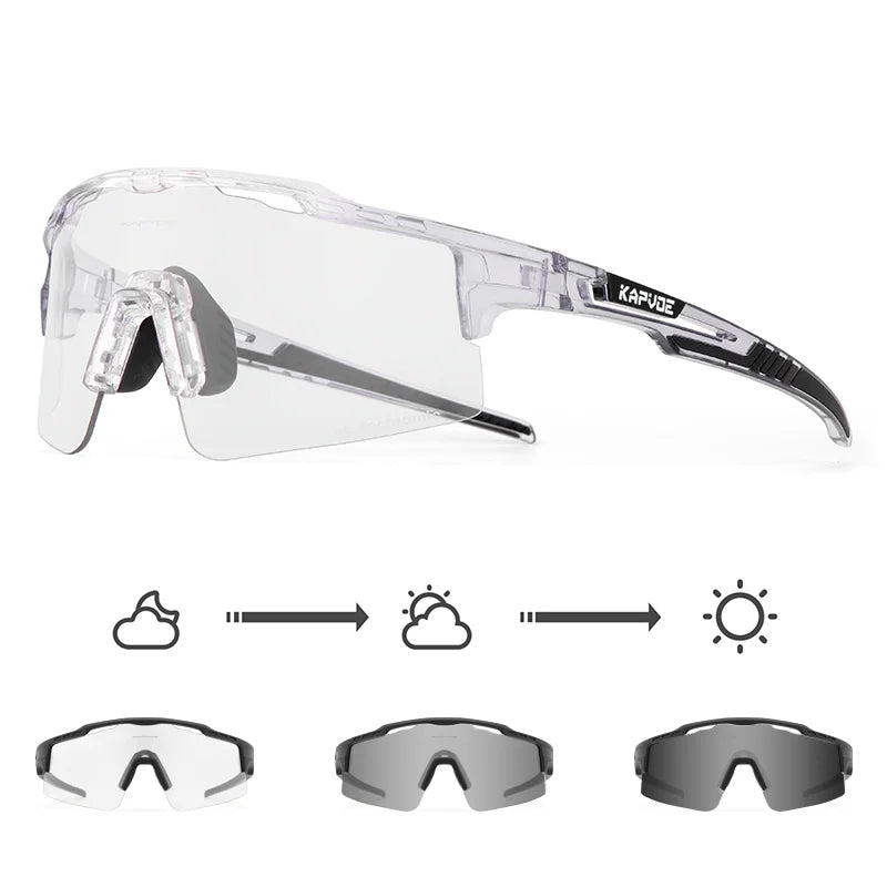 Photochromic cycling sunglasses with clear lens, black accents, and light-adjusting feature.
