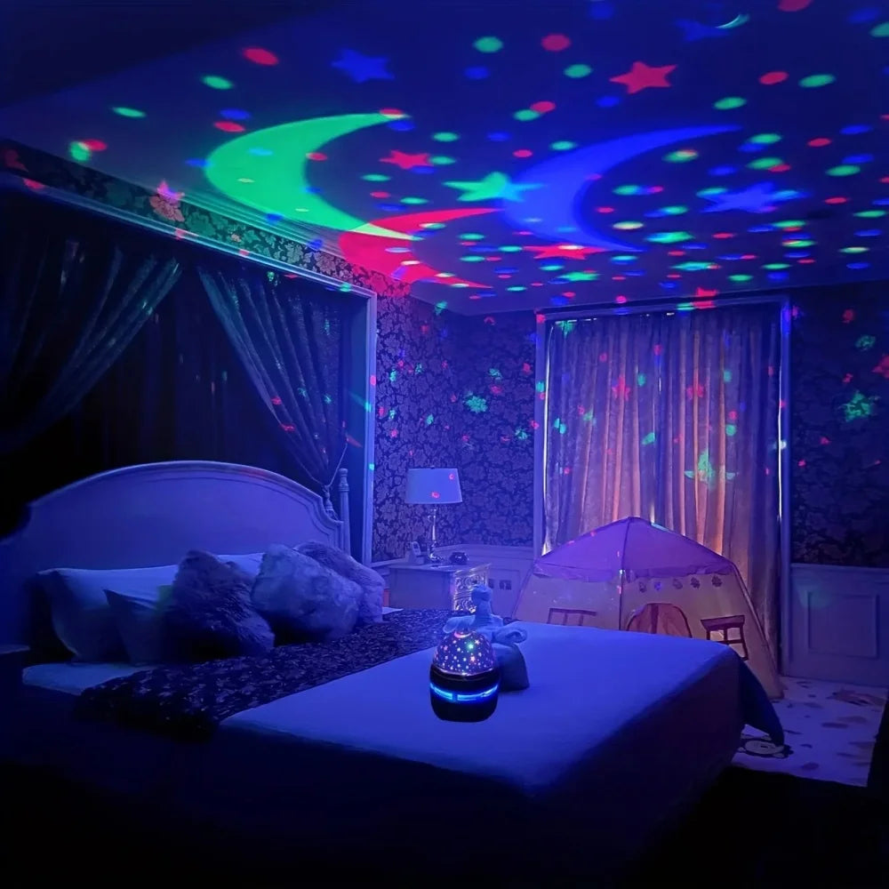 Colorful star and moon projector night light casting patterns on bedroom walls and ceiling.