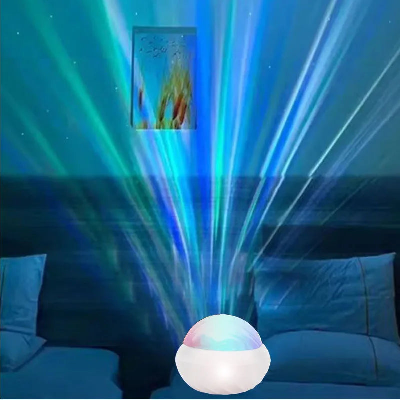 RGB LED night light projector casting colorful aurora lights on bedroom walls and ceiling