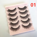 Set of five pairs of dramatic false eyelashes on a pink tray, labeled style 01