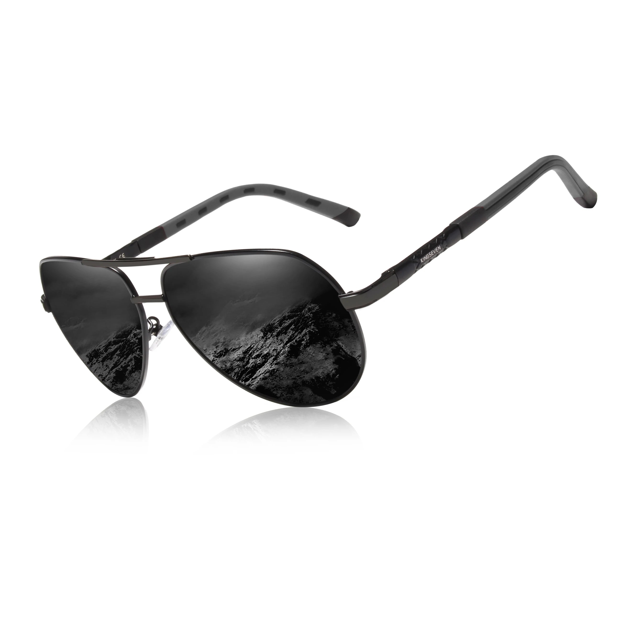 Stylish black aviator sunglasses with mountain reflection in dark lenses
