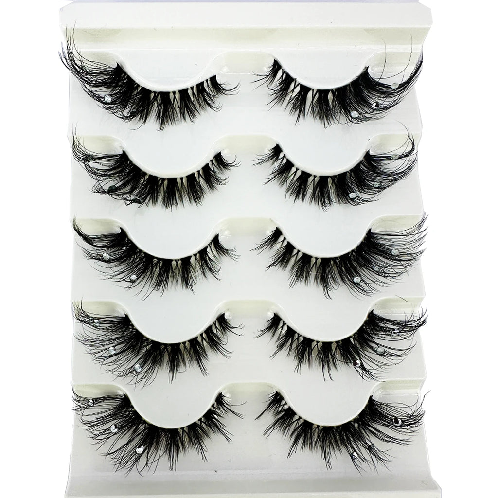 Pack of dramatic black false eyelashes with rhinestone accents in white tray