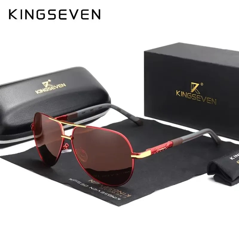 Red and gold sunglasses with brown lenses, case, and gift box on display.