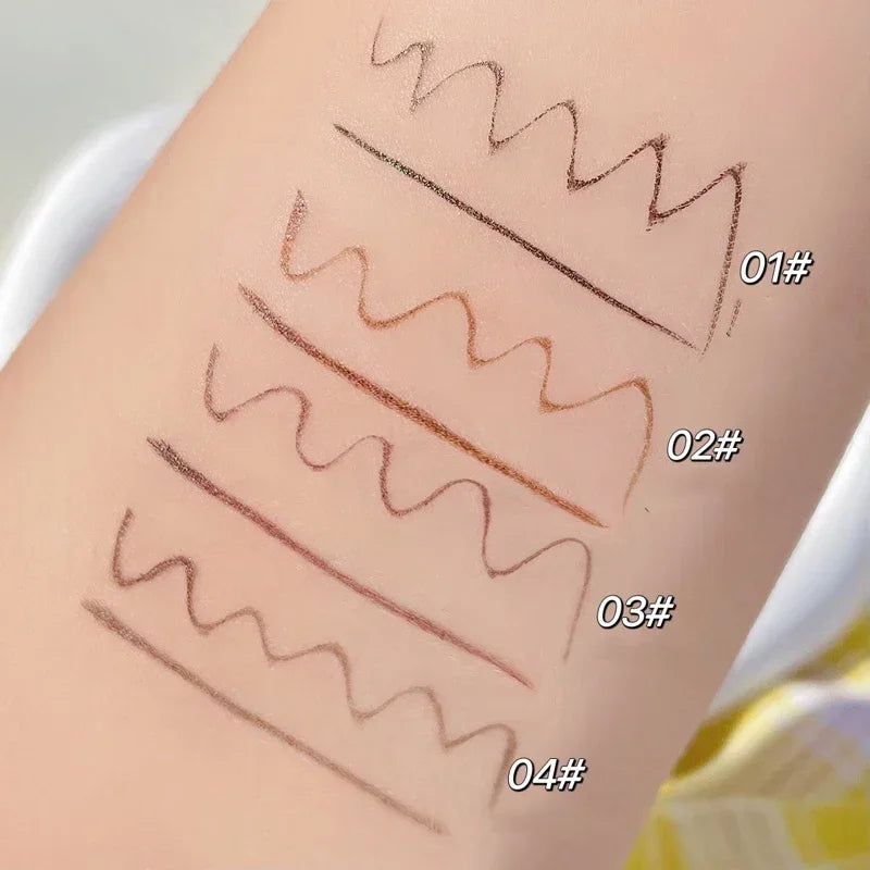 Swatches of four eyebrow pencil shades labeled 01 to 04 on a forearm
