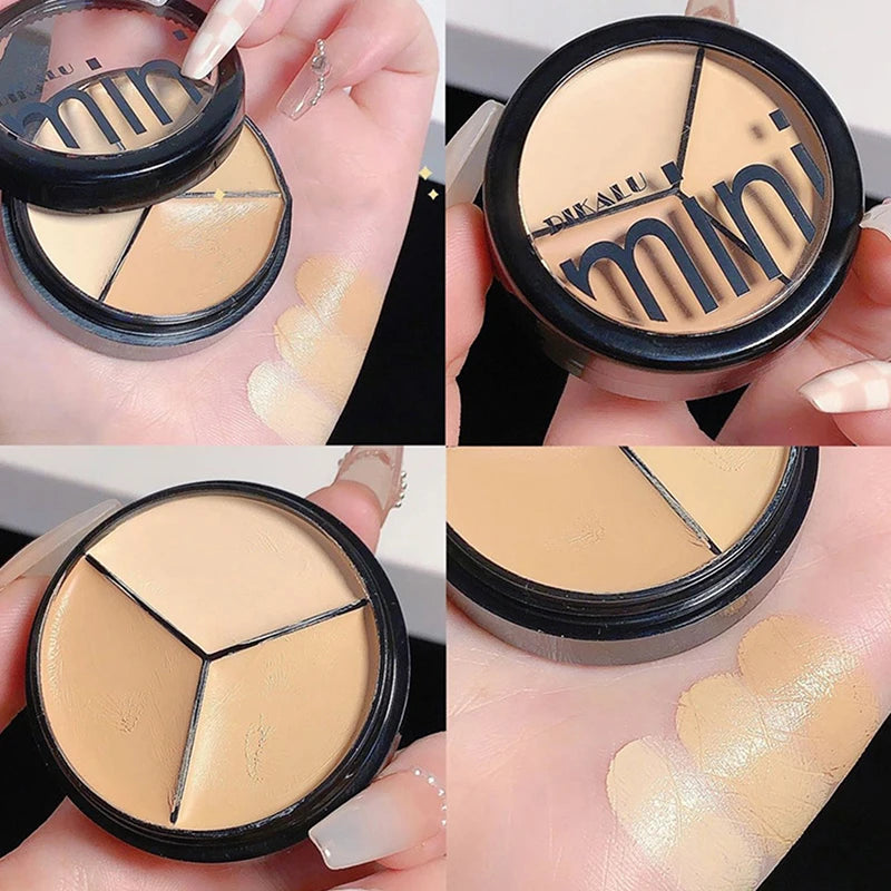 Triple shade cream concealer palette for face makeup, swatched on hand