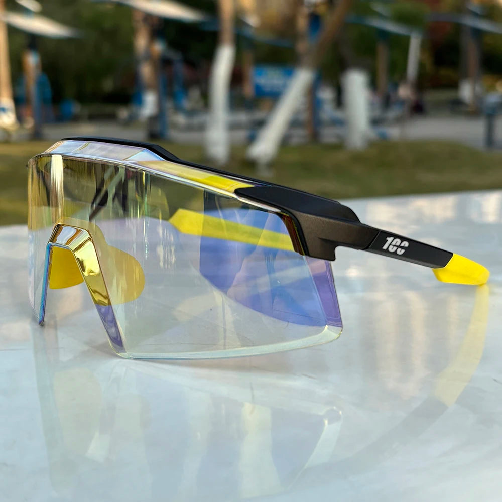 Yellow and black sports sunglasses with mirrored shield lens on outdoor table