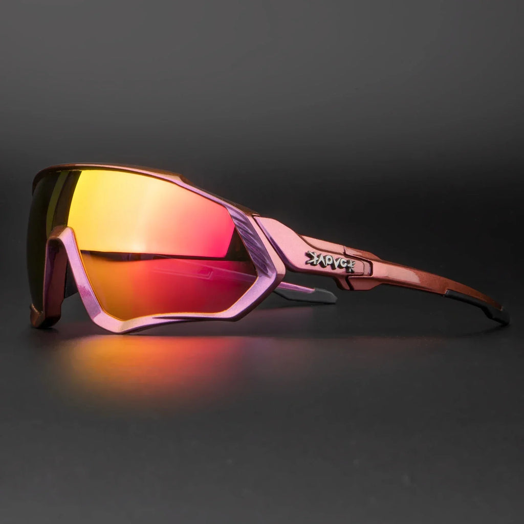 Futuristic sports sunglasses with pink and orange mirrored lenses on a dark background