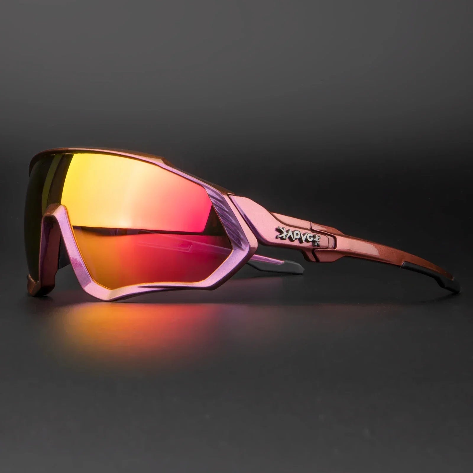 Futuristic sports sunglasses with pink and orange mirrored lenses on a dark background