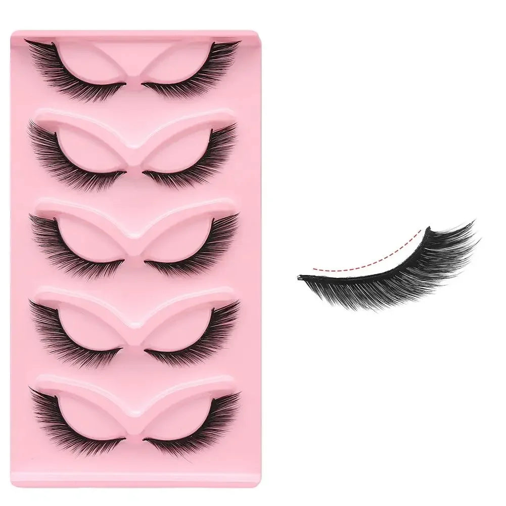 Set of four pairs of dramatic black false eyelashes in a pink tray, with one lash shown separately.