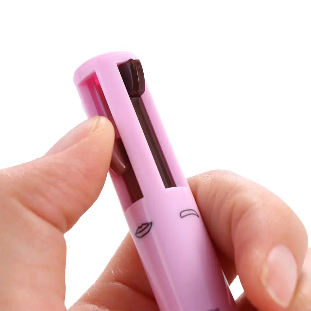 Hand holding pink multi-color pen with lipstick and eyebrow symbols, close-up