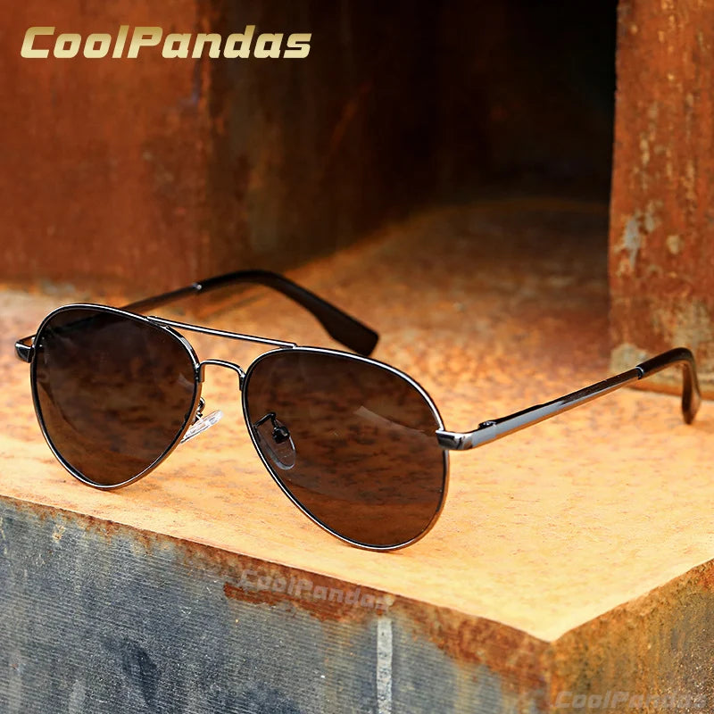 Aviator sunglasses with dark lenses and black metal frame on a rustic surface