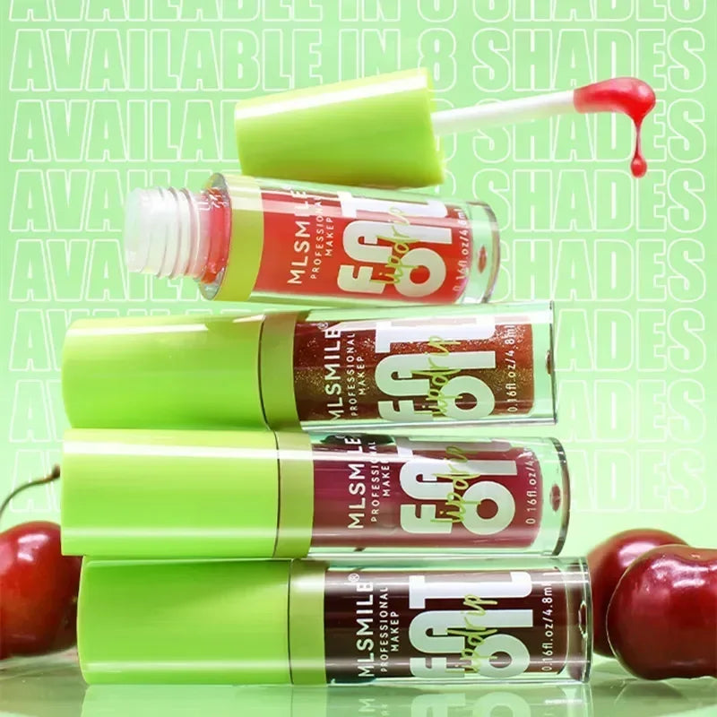 Stack of MLSMILE lip gloss tubes with green caps and cherries, vibrant makeup colors