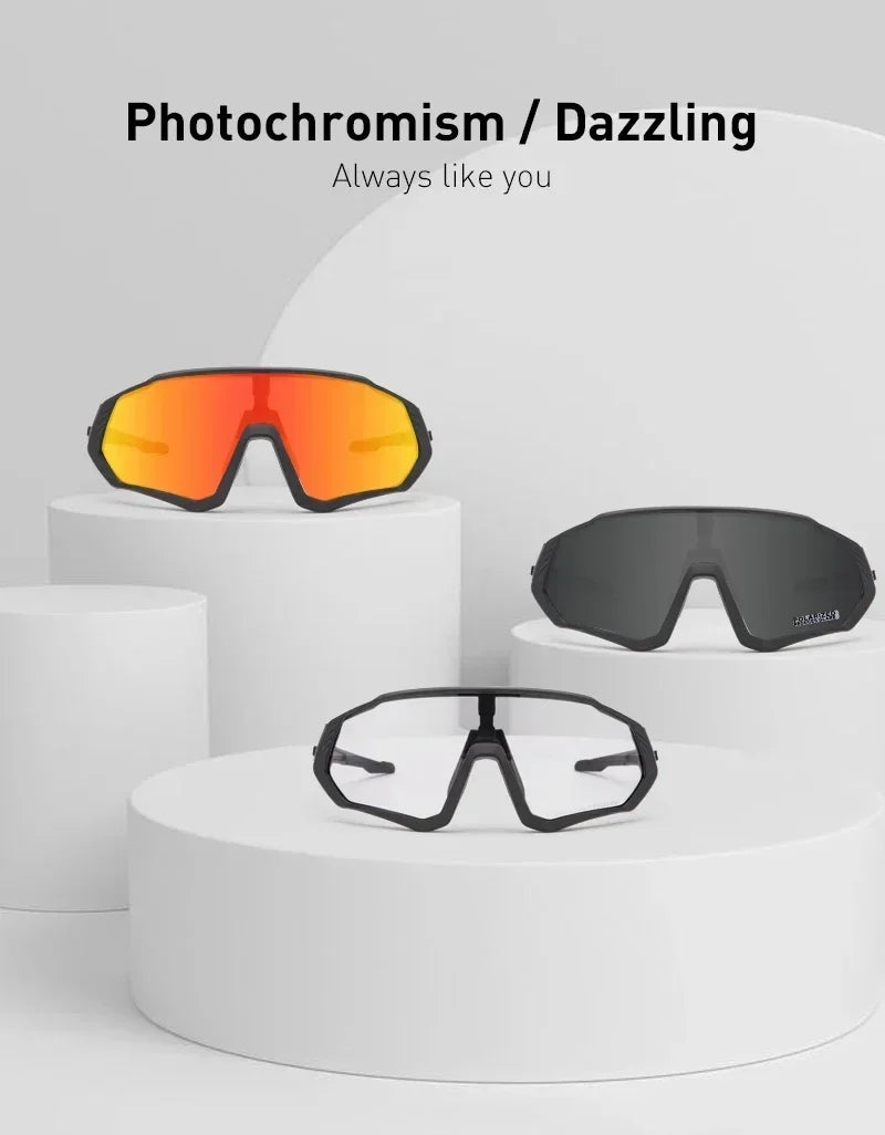 Three pairs of photochromic sports sunglasses with different lens colors on white podiums.